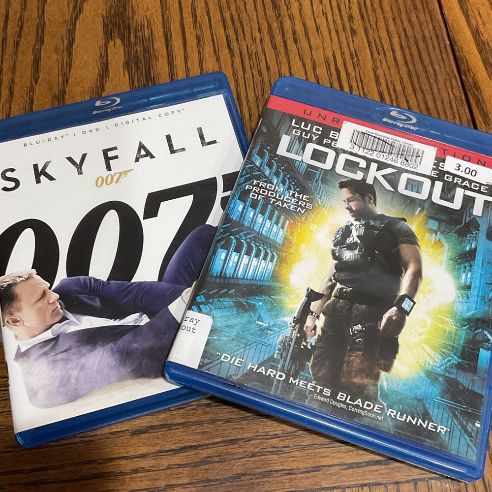 SKYFALL James Bond 007 Daniel Craig & LOCKOUT a futuristic thriller Blu-rays